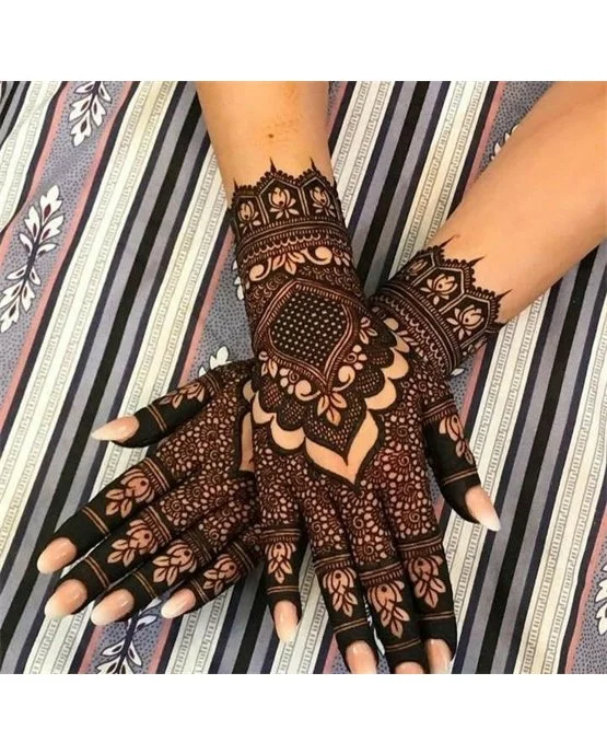 Dainty Detailing Blending Into Floral Back Hand Mehndi Design